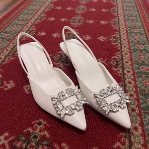 Lovely white kitten heel